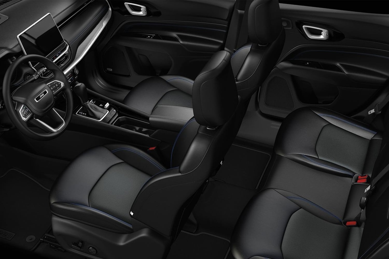 Cabine intérieure du Jeep Compass 2025 avec fonctionnalités technologiques avancées, commandes ergonomiques et sièges avant confortables