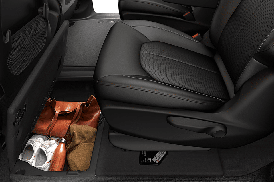 2025 Chrysler Grand Caravan Stow n Go seating folded flat for maximum cargo space